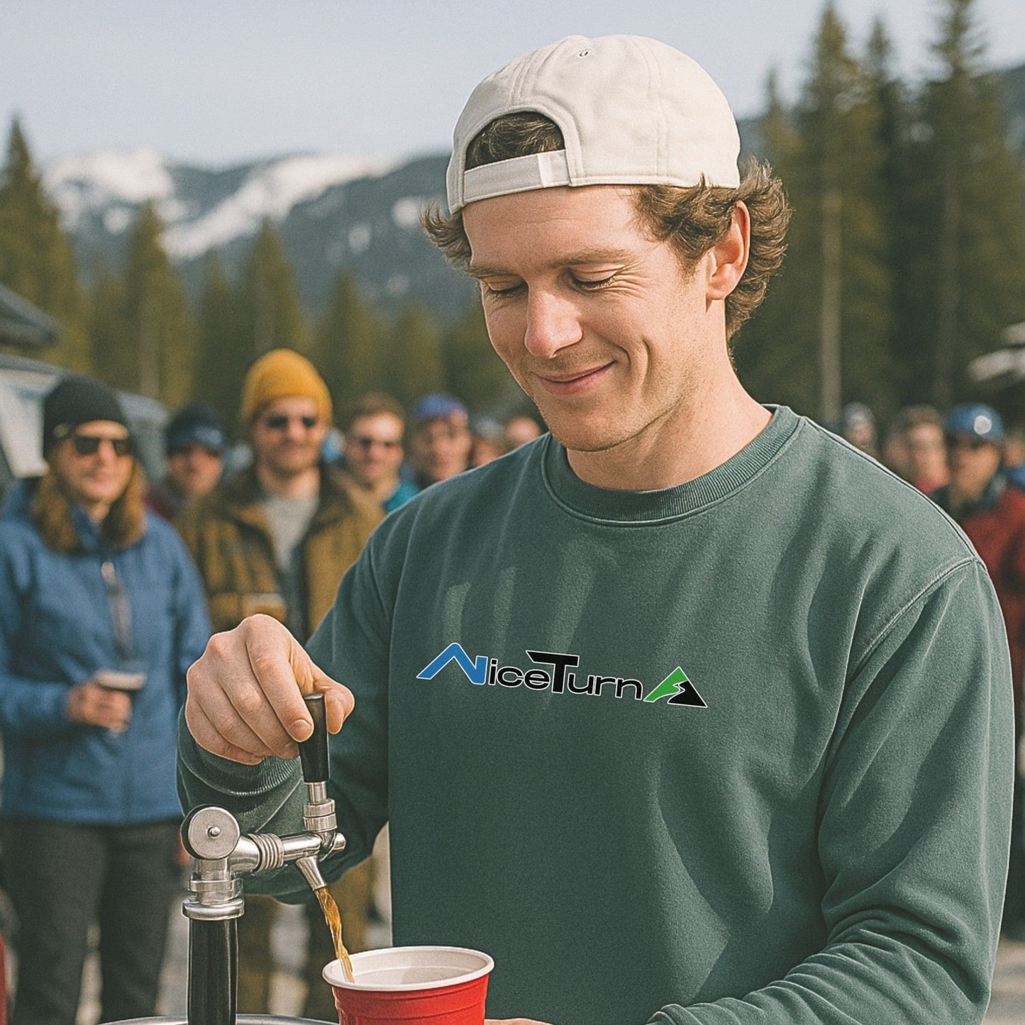 Front view of a green nice turns crewneck sweatshirt, worn by skier pouring a beer at a sunny après tailgate in the ski resort parking lot.