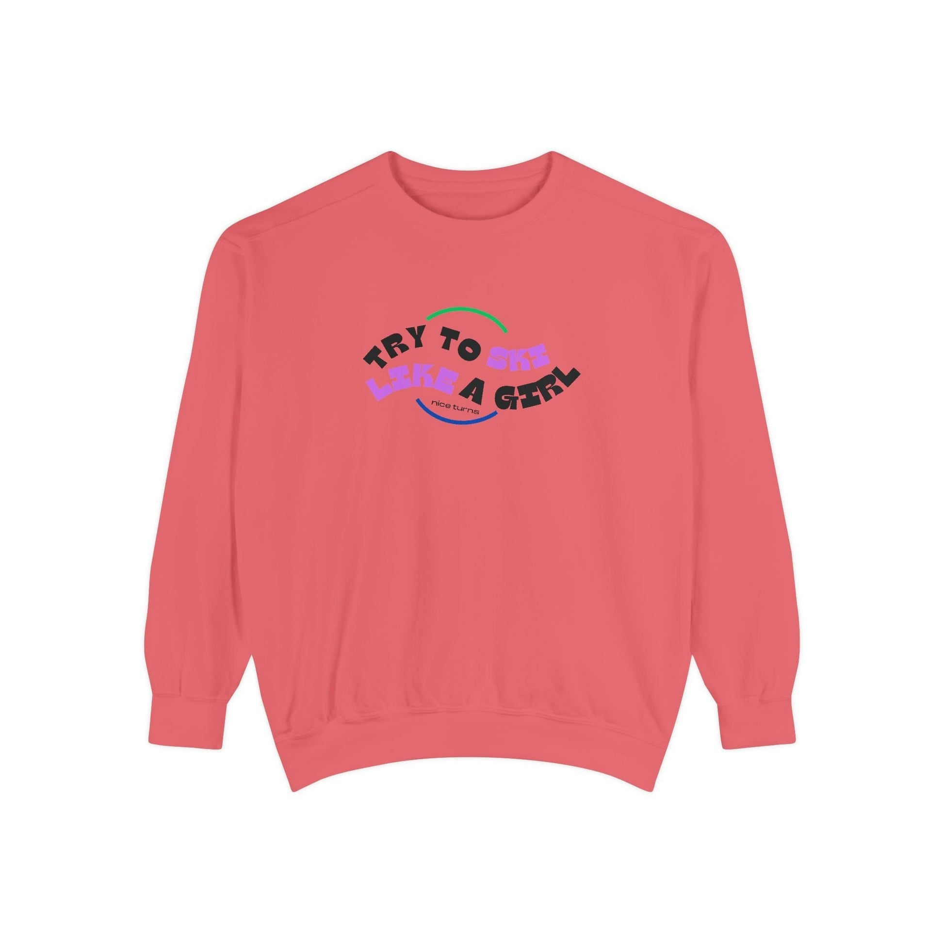 Flat lay of watermelon pink sweatshirt with colorful Try to Ski Like a Girl logo across chest, displayed on white background
