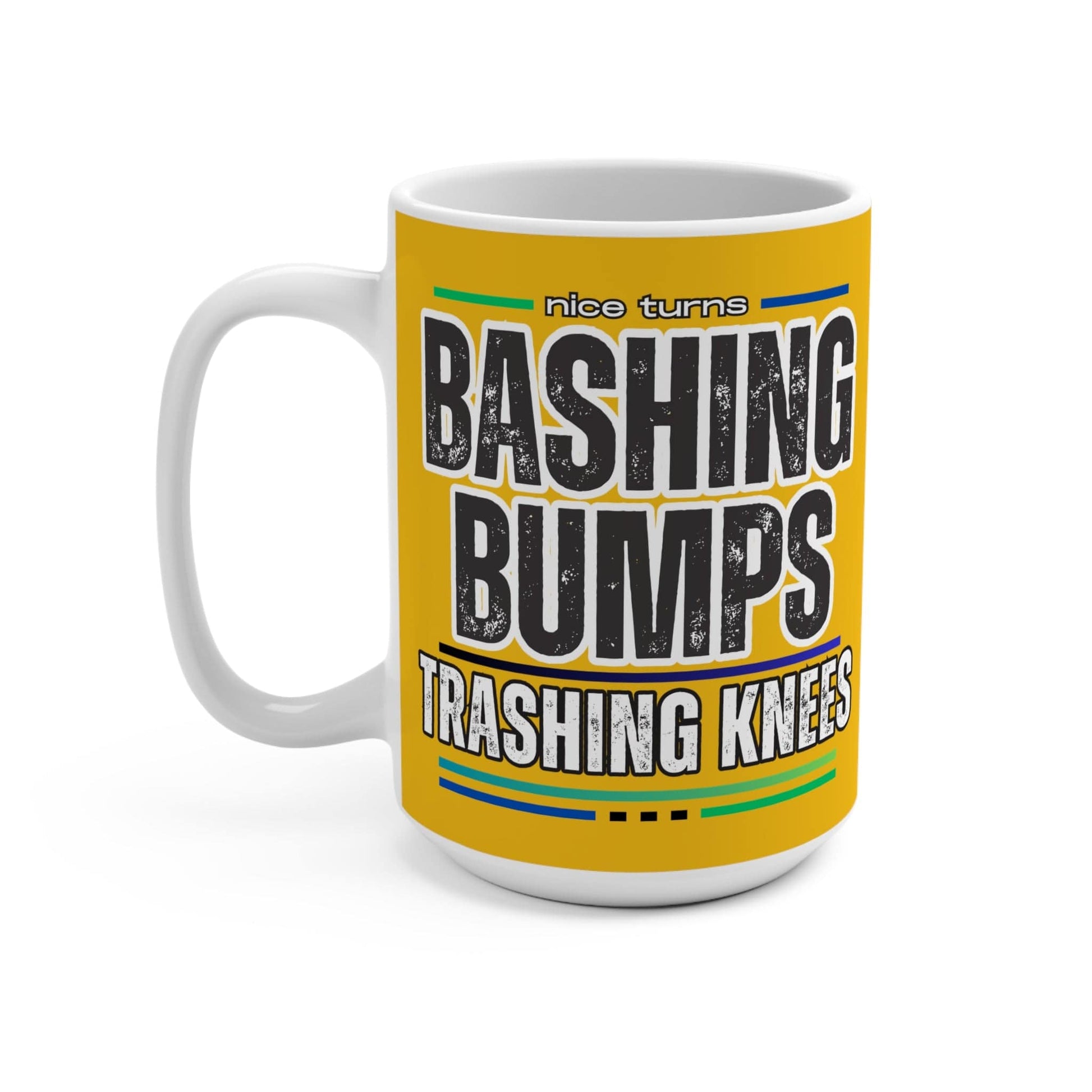 Bashing Bumps 15 oz coffee mug, yellow background, right side view with bold “Bashing Bumps Trashing Knees” wraparound graphic; C-handle.
