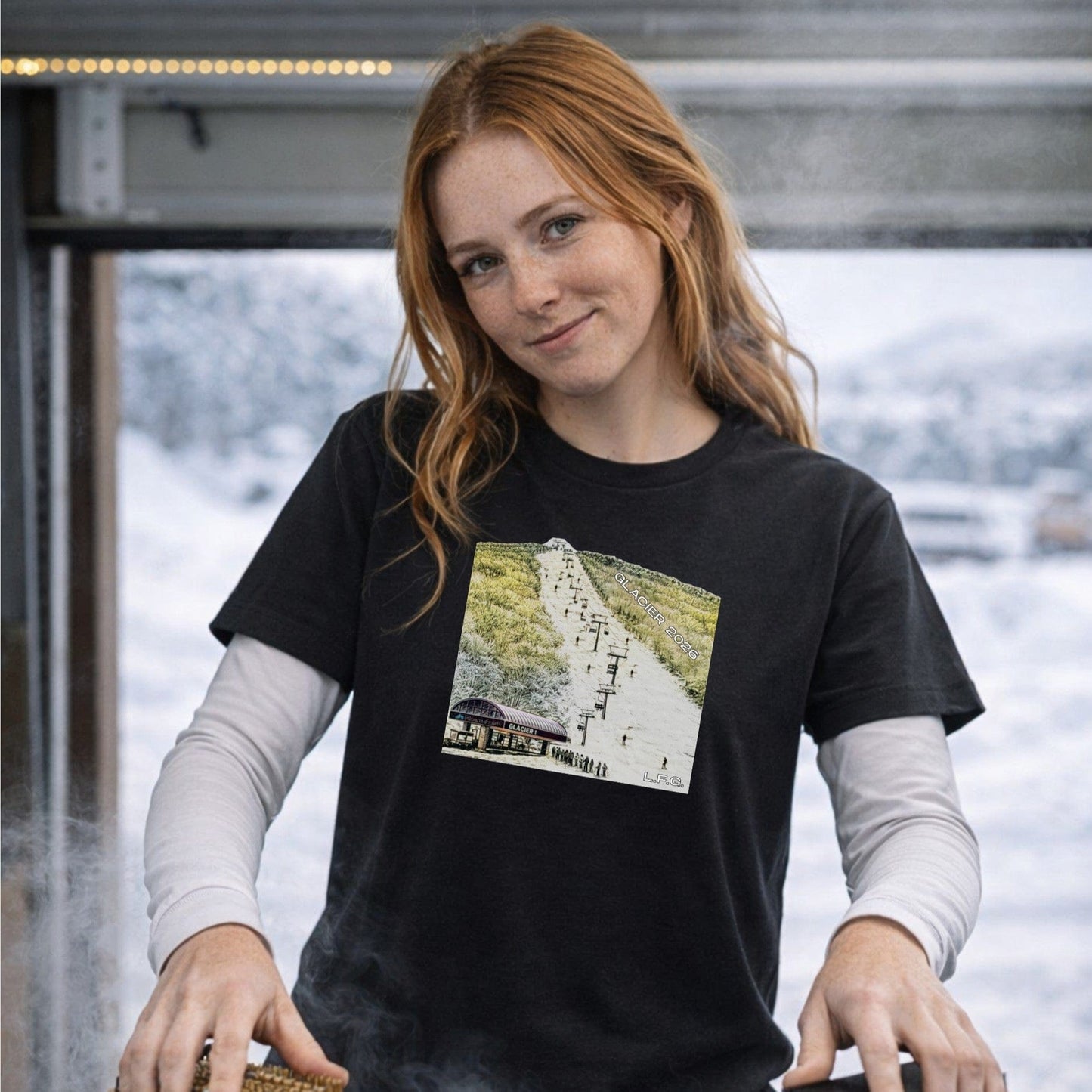 Female skier wearing navy glacier t-shirt front view indoors