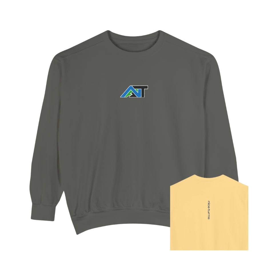 Flat lay of two-tone sweatshirt with gray front featuring AT logo and butter yellow back with vertical nice turns text, shown with small rear view inset in lower right corner